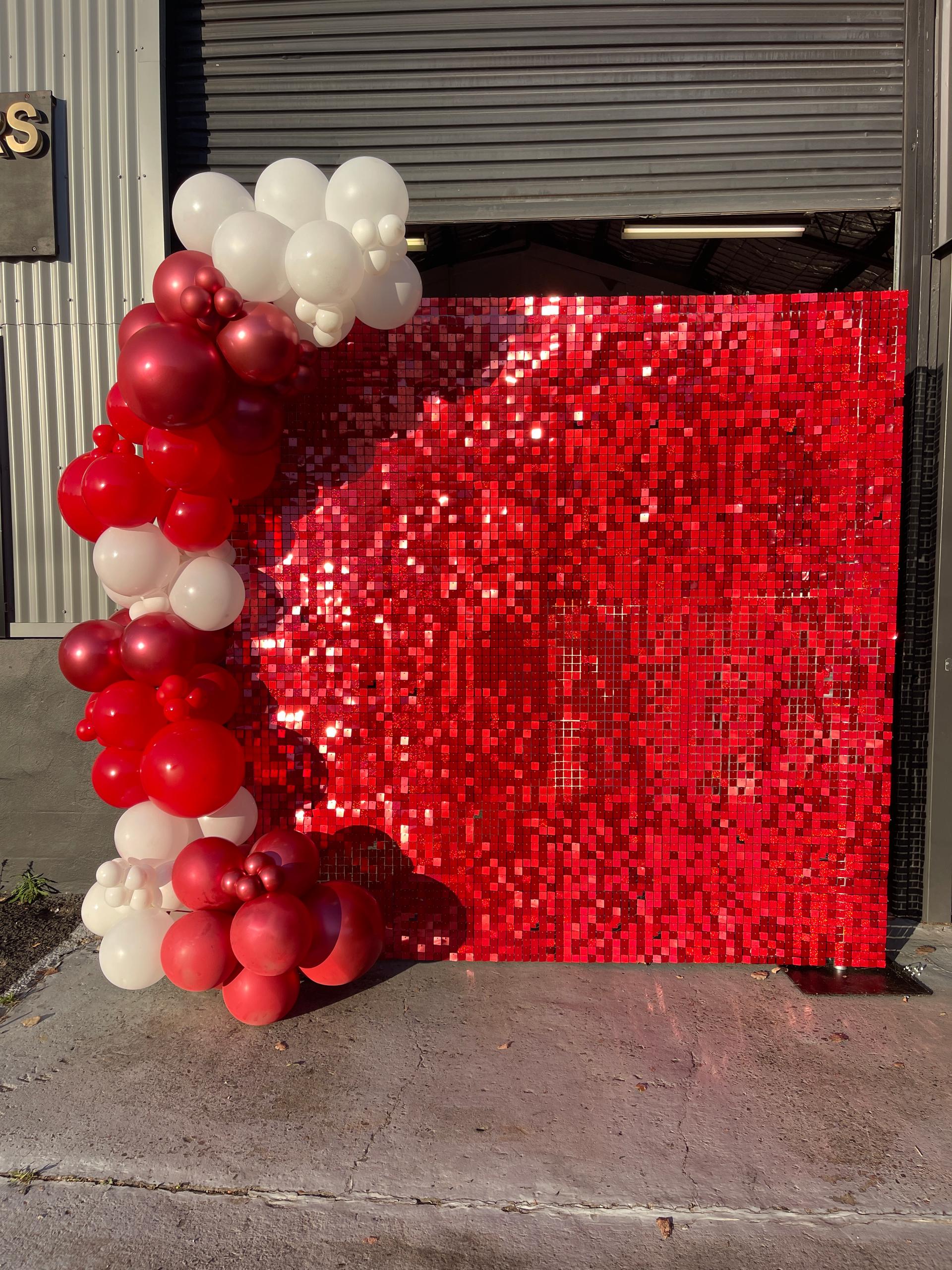 red shimmer wall with balloons