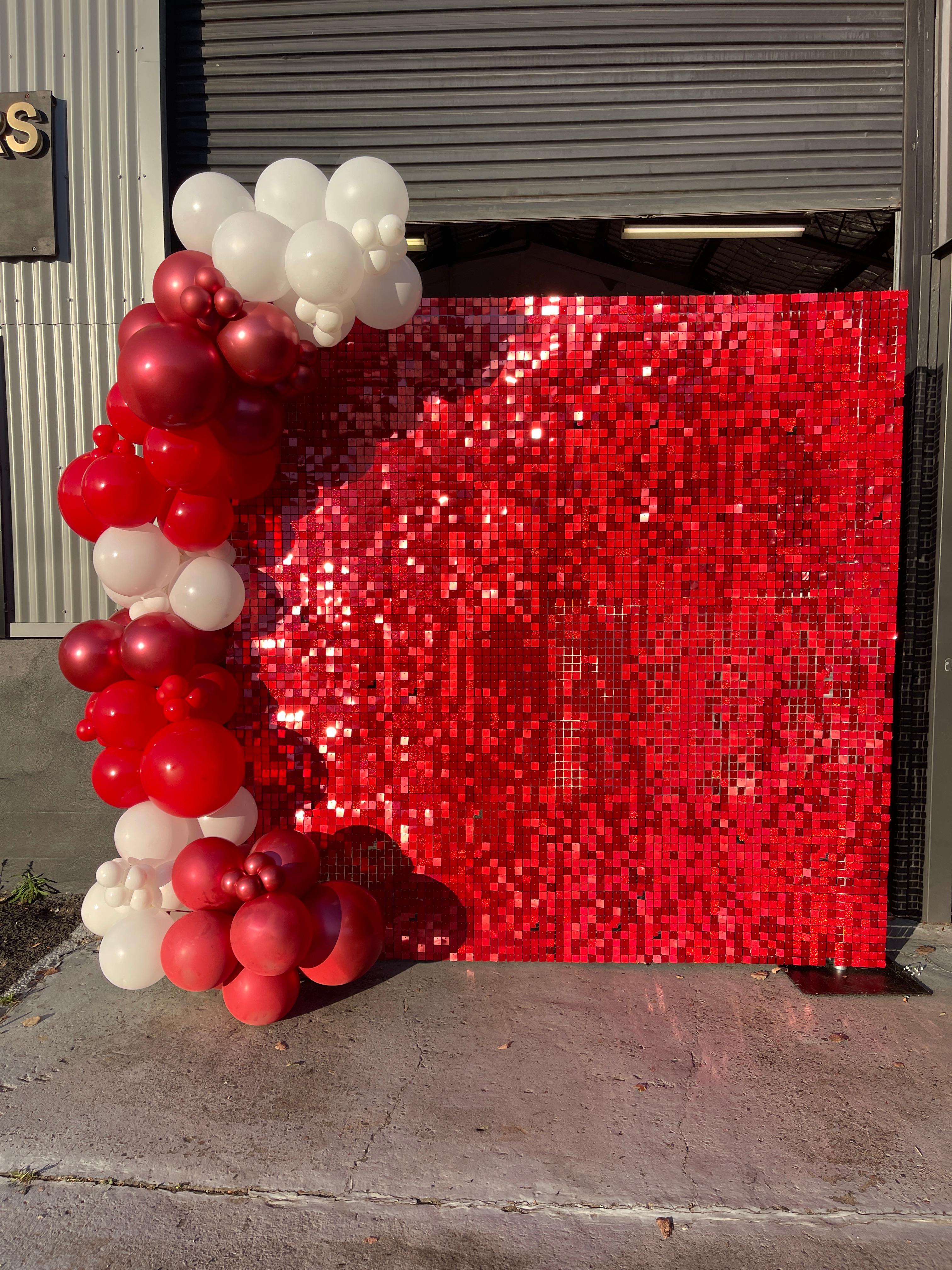 red shimmer wall with balloons