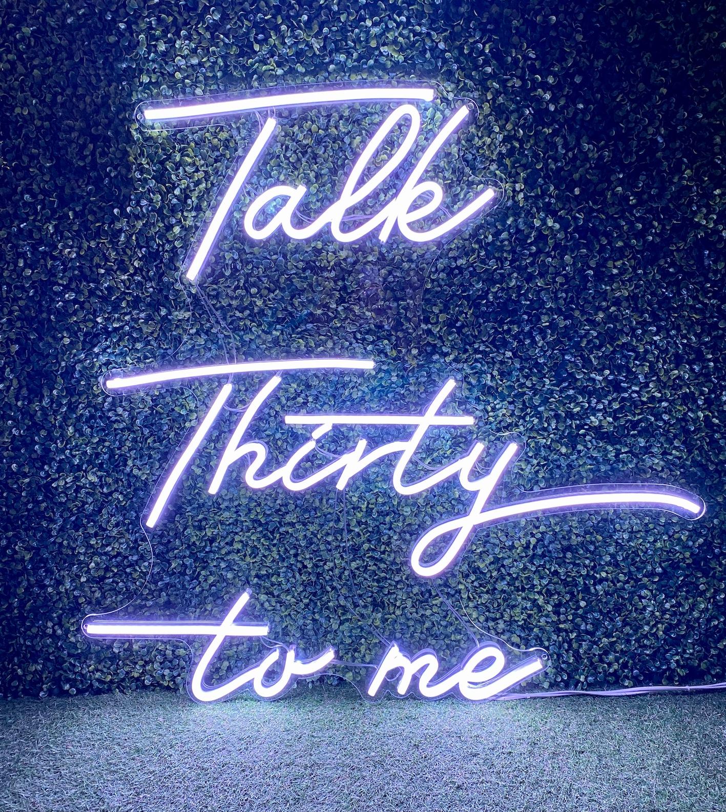 Talk thirty to me neon sign